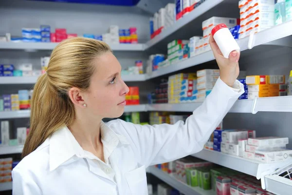 Pharmacist Searching Right Medicine — Stock Photo, Image