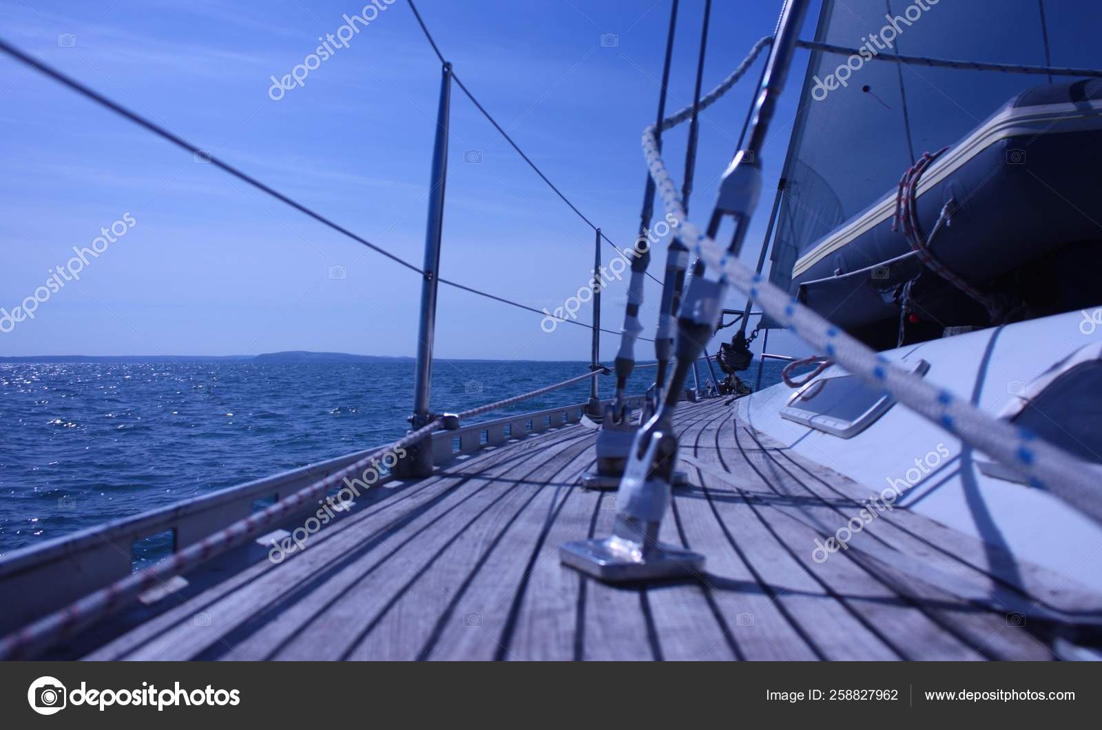 Curved Teak Deck Yacht Sailing Sea Stock Photo by ©YAYImages 258827962