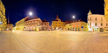 Town of Ptuj historic main square panoramic evening view, northern Slovenia clipart