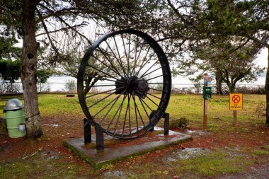 Old disused hydroelectric flywheel clipart