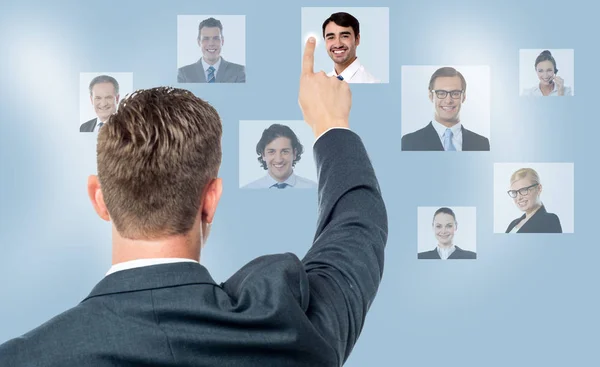 Rear View Man Pointing Coworkers Picture Screen — Stock Photo, Image