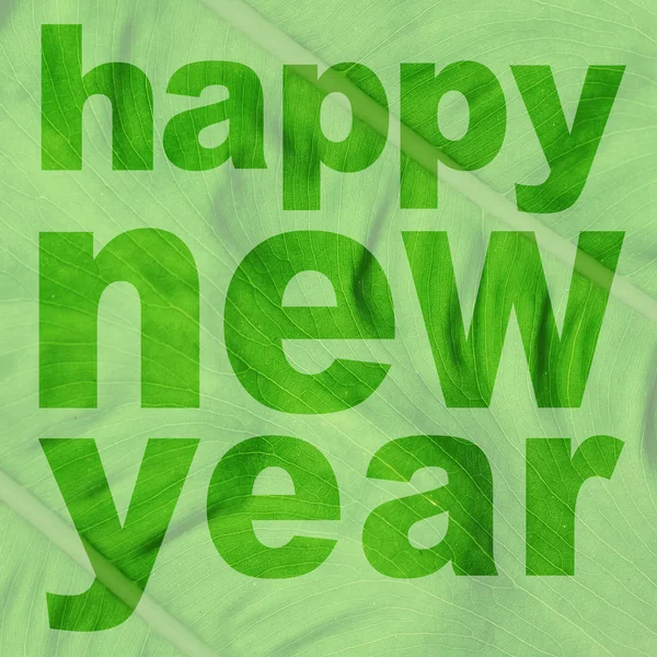 Слово Щасливий Новий Рік Зроблено Зеленого Листя Картини — стокове фото