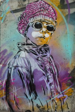 A hip graffiti character with sunglasses. clipart