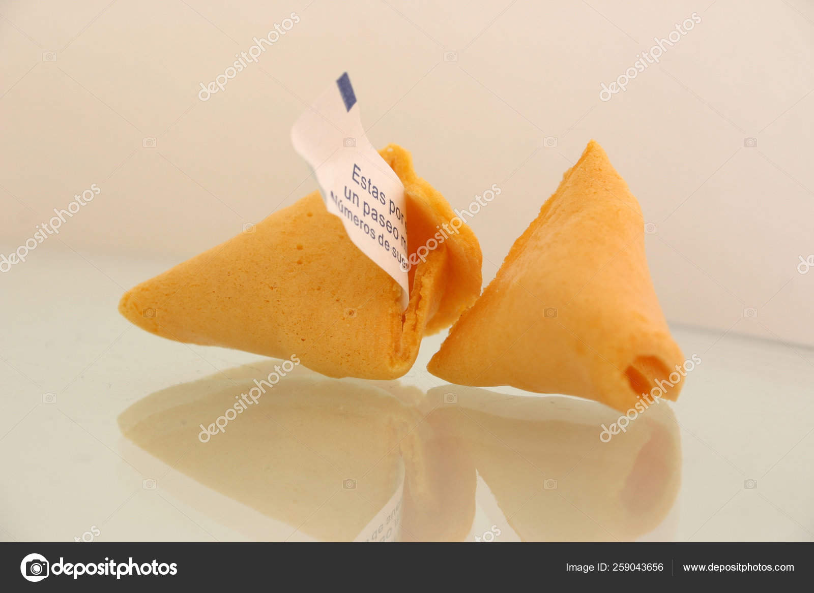 Open Fortune Cookie Slip Paper Sticking Out Stock Photo by ©YAYImages