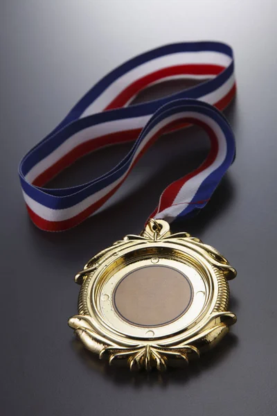 Золотая Медаль Заднем Плане — стоковое фото