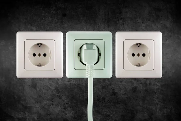 Três Pequenas Tomadas Eletricidade Uma Parede — Fotografia de Stock