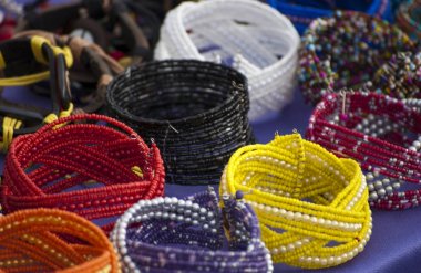 Colorfull bracelets at local market clipart