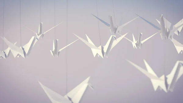 A lovely 3d illustration of a flock of white paper cranes soaring high in the grey background. They tell us about our happy childhood and young years.They fly in a big group.