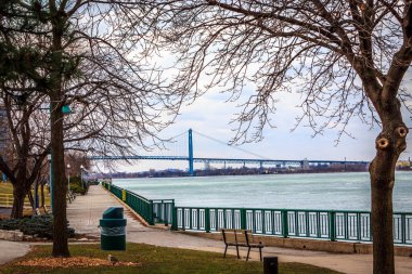 Ambassador Bridge entering USA as seen from Dieppe Gardens, Windsor, Ontario  clipart