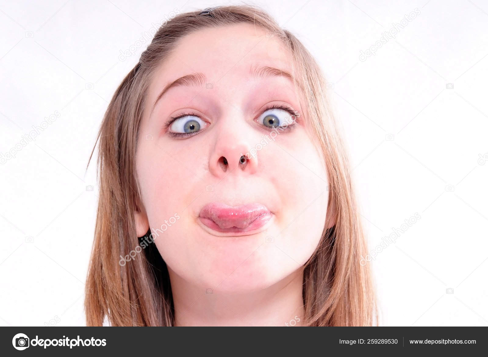 Studio Shot Beautiful Girl Making Faces Isolated White Background Stock Photo Image By C Yayimages