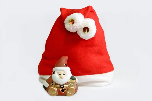 Cappello Babbo Natale Con Figura Babbo Natale Sfondo Chiaro — Foto Stock
