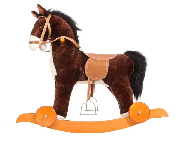 サドル ブライドル ホイールを持つ茶色のおもちゃの馬 — ストック写真