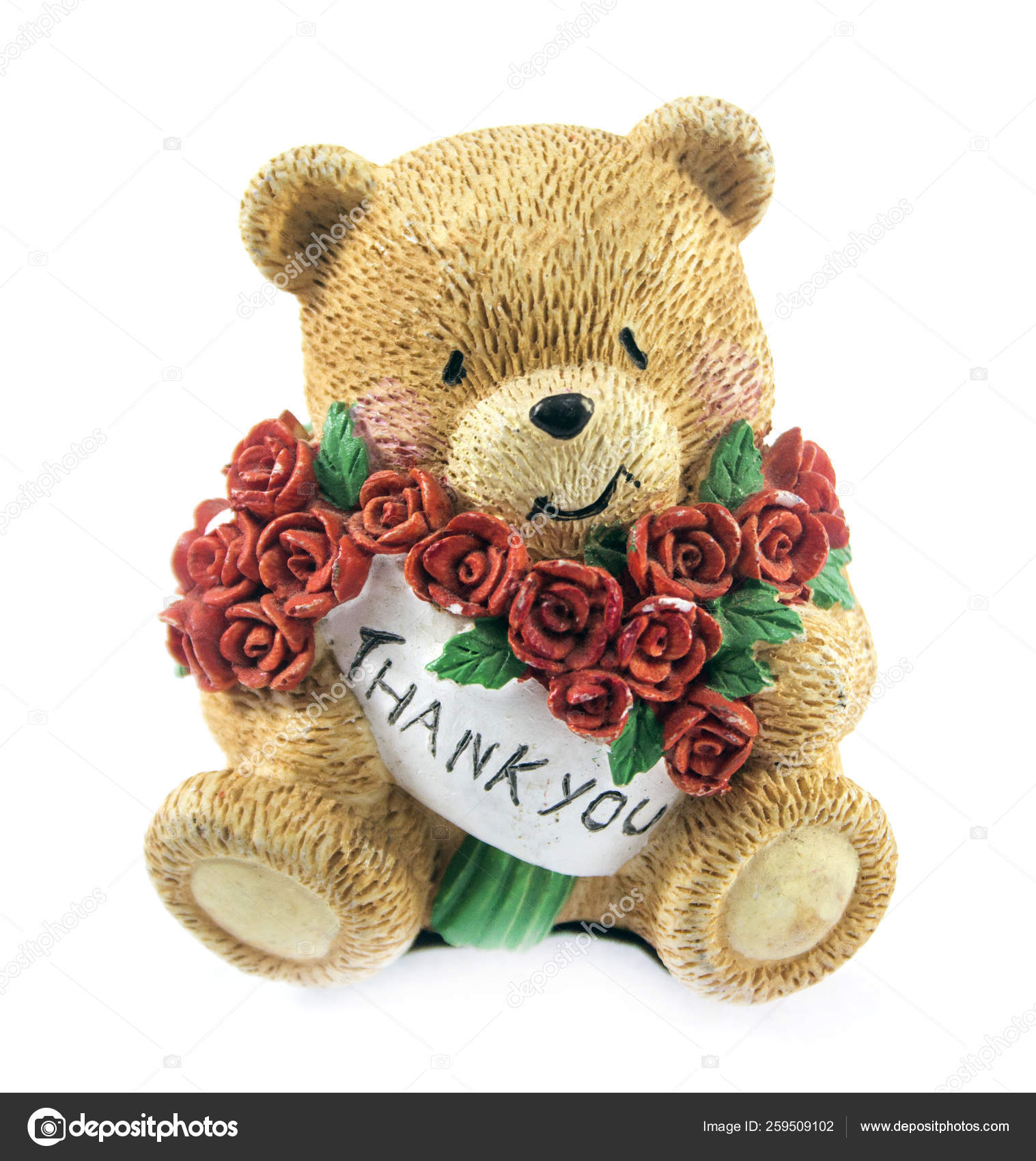 teddy bear holding a rose