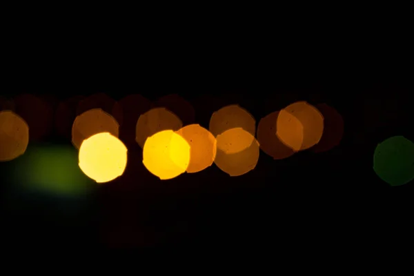 Geel Licht Een Zwarte Achtergrond Abstractie Nacht Stad — Stockfoto
