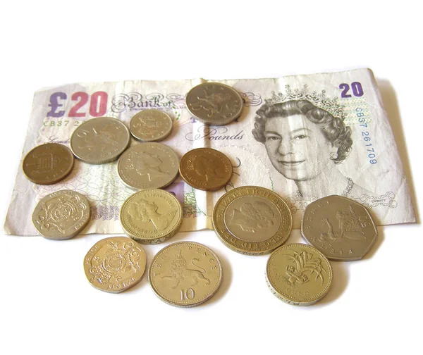 英国のポンドの銀行券および硬貨 — ストック写真