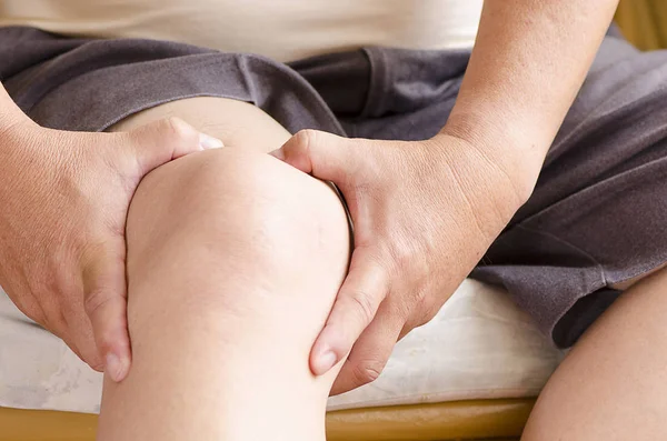 Man Chair Holding His Knee Because Pain — Stock Photo, Image
