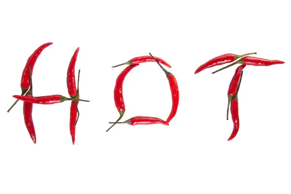 Spicy Red Peppers Forming Word Hot — Stock Photo, Image