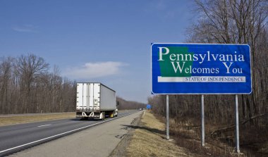 Semi-Truck entering state of Pennsylvania clipart