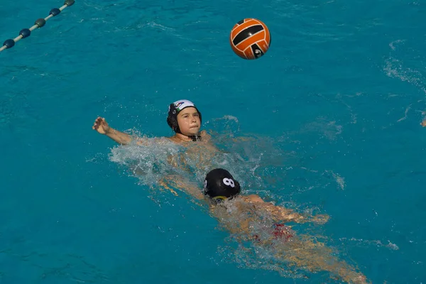 boy in action during a water polo match