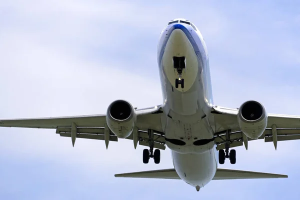 Image of an airplane about to land.