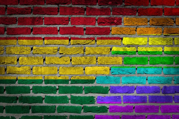 黑砖砌墙的纹理 国家国旗和彩虹旗画在墙上 玻利维亚 — 图库照片