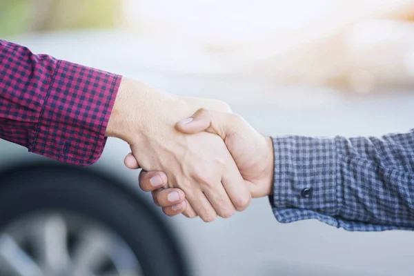 Closeup Business Hand Shake Two Colleagues Plaid Shirt Car Sales — Stock Photo, Image
