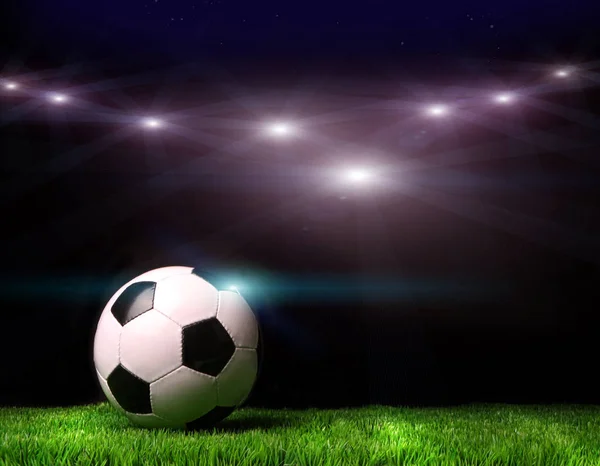 Fußball Auf Gras Vor Schwarzem Hintergrund — Stockfoto