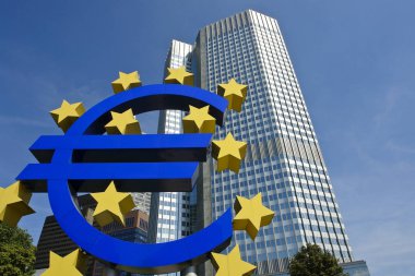 Street view of the ECB administrative building with the well known sculpture of the European currency unit. clipart