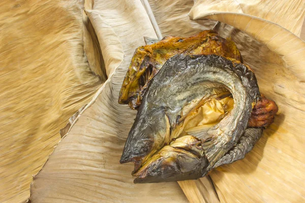 closeup dry fish on dry banana leaf