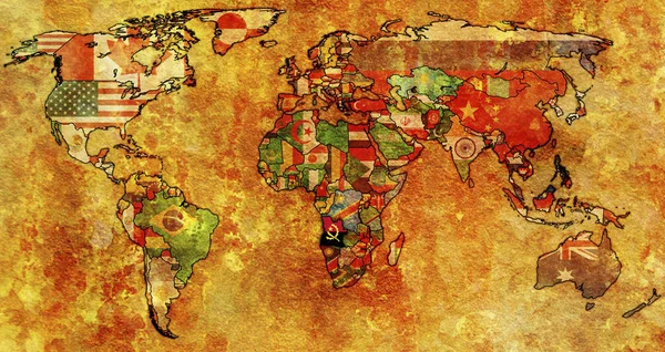 挂满安哥拉国旗的旧世界地图 — 图库照片