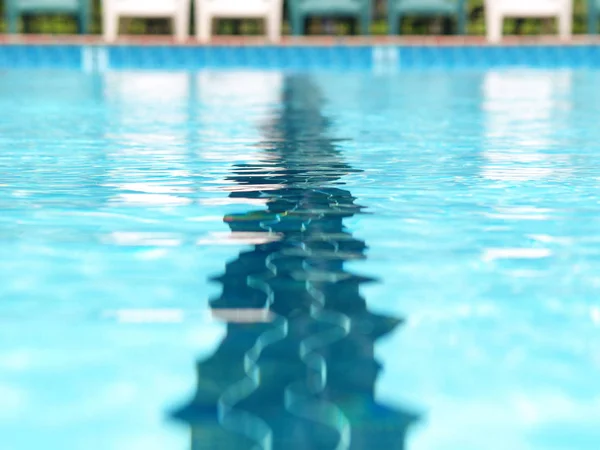 Closeup of the distortions of a swimming lane marker in a pool