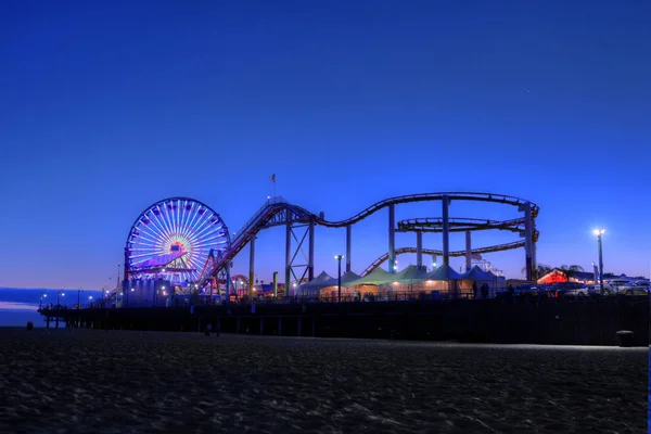 Old Ferris Wheel and Santa Monica Pier at Twilight in Santa Monica, California USA