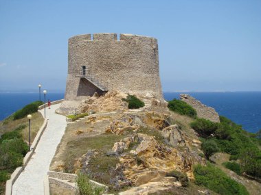 Spanish tower in Sardinia in Santa Teresa Gallura, Sardinia, Italy. clipart