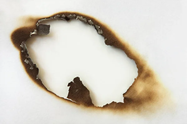 Burn Hole White Paper — Stock Photo, Image