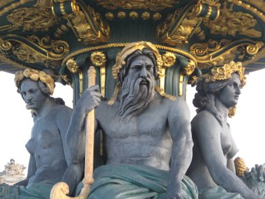 three statues of the Concorde square fountain in Paris clipart