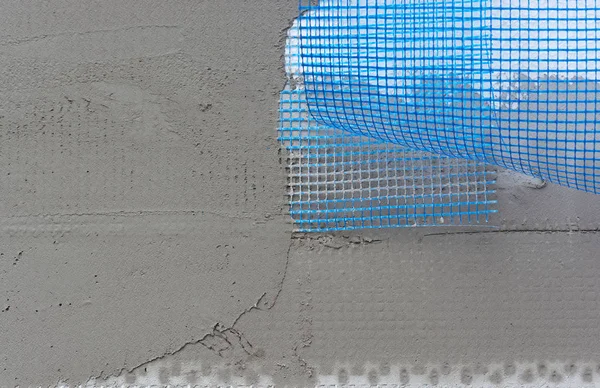 聚苯乙烯保温板覆盖着网覆盖和砂浆 — 图库照片