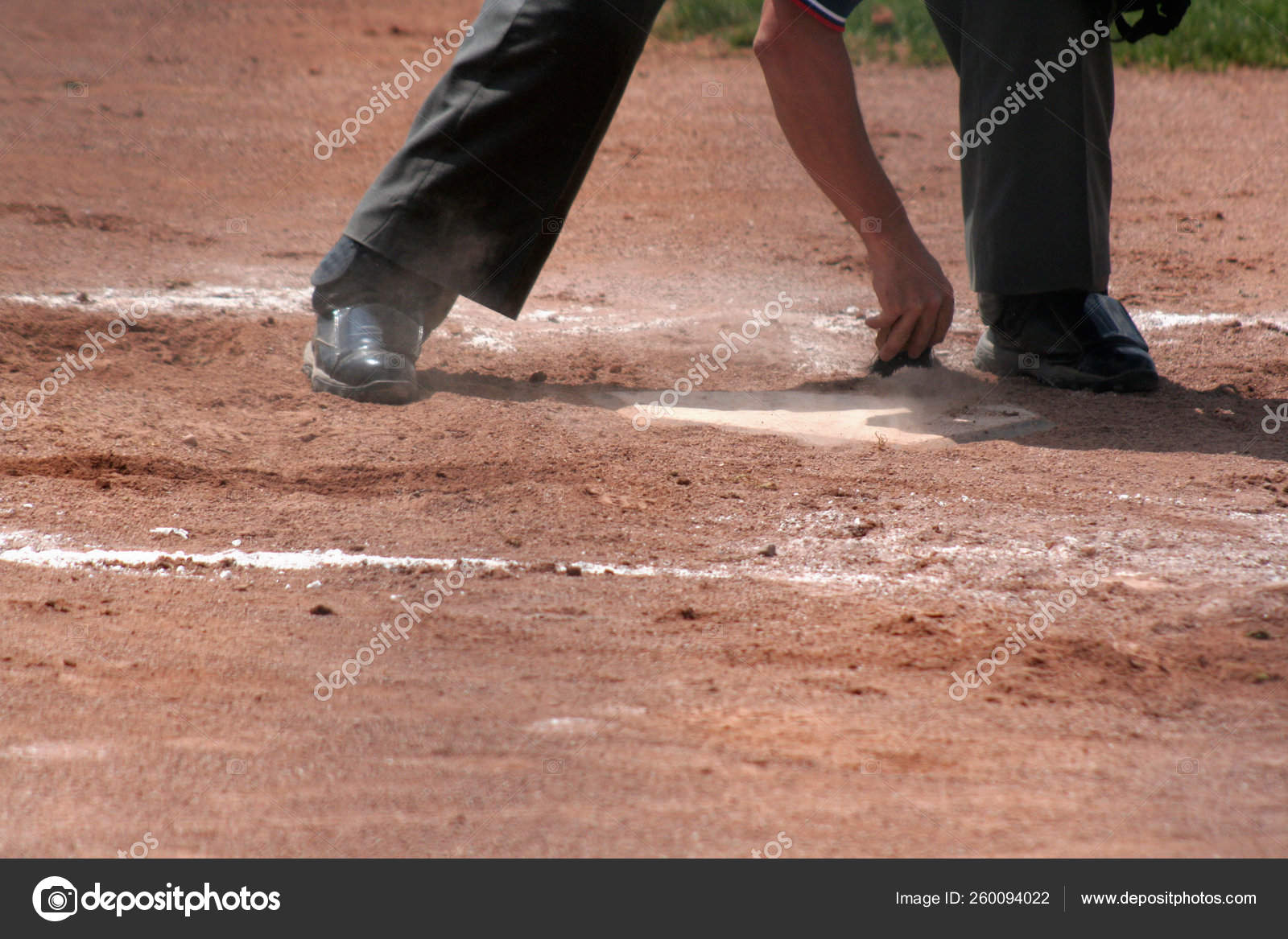 Umpire Dusts Home Plate Stock Photo by ©YAYImages 260094022