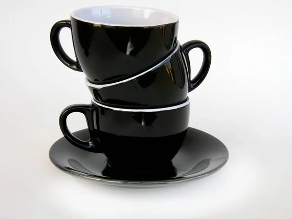 Три Чорні Чашки Ізольовані Білому Тлі — стокове фото