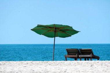 Beach umbrellas and deck chairs, Puerto Escondido, Mexico clipart