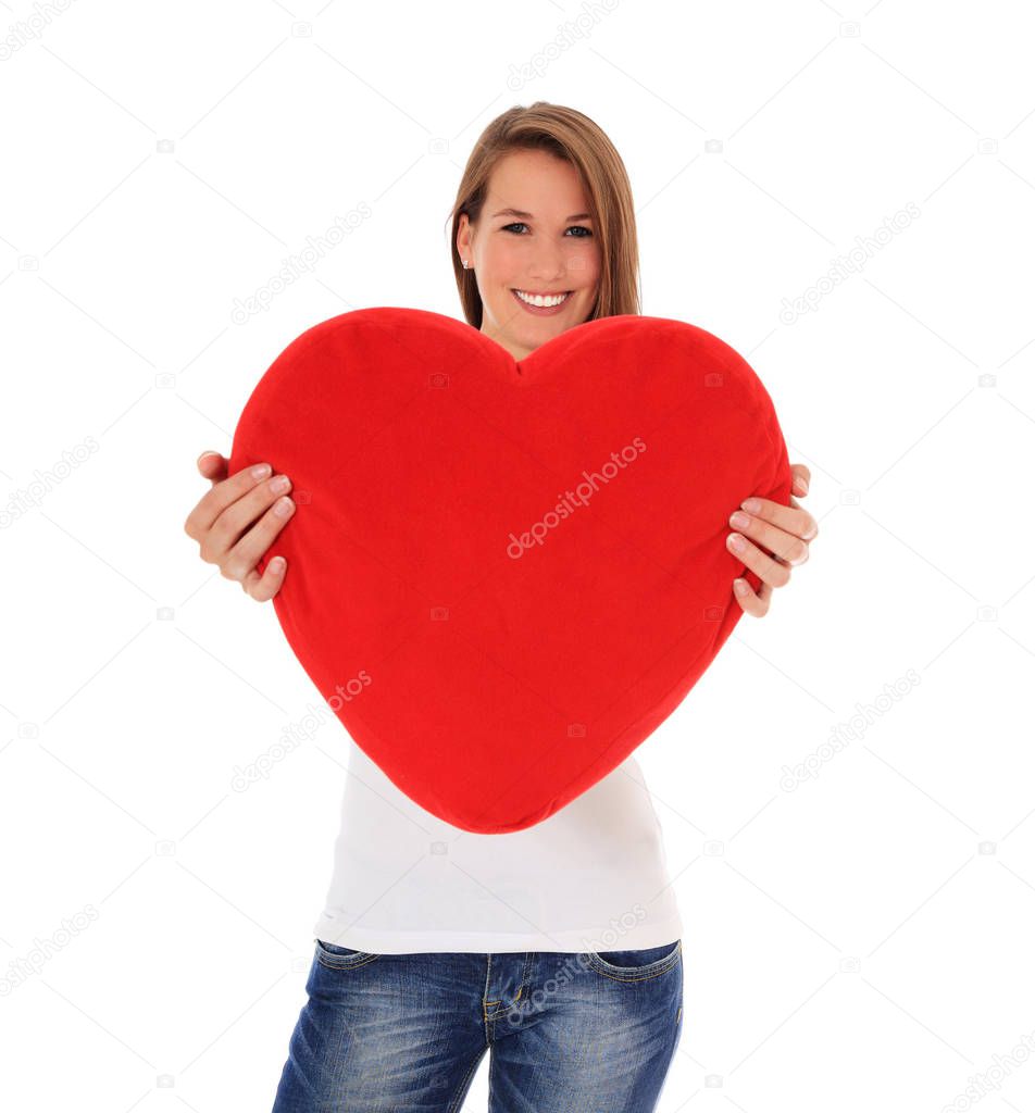 Attractive Young Woman Hugs Red Heart Shaped Pillow All Whit
