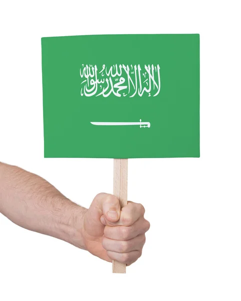 Hand Met Kleine Kaartje Geïsoleerd Wit Vlag Van Saoedi Arabië — Stockfoto
