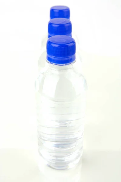 Acqua Bottiglia Isolata Vari Sfondi — Foto Stock