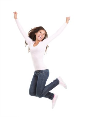 Happy woman jumping. Excited young woman jumping of joy. Full length portrait of mixed race chinese / caucasian model isolated on seamless white background. clipart