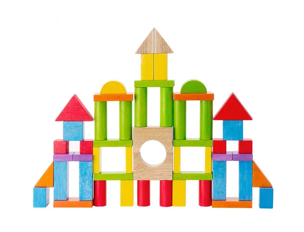 白にカラフルな木製のおもちゃの城 — ストック写真