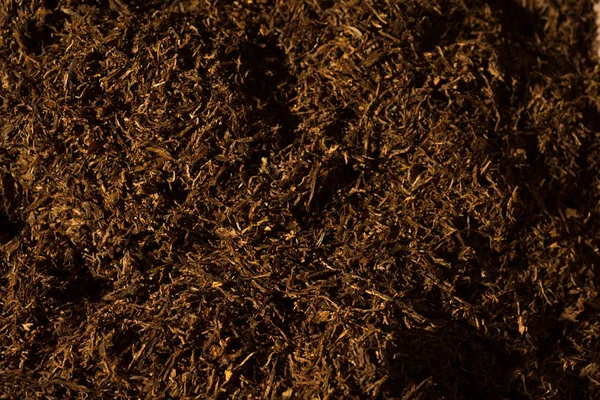 Ψιλά Κομμένα Καπνά Λεπτομέρεια Υπόβαθρο Μέσα Μια Μηχανή Παραγωγής Τσιγάρων — Φωτογραφία Αρχείου