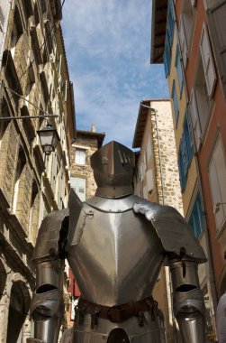 Suit of armor exhibited in the street of Puy en Velay, France clipart