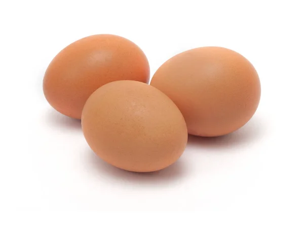 Três Ovos Galinha Amarelos Fundo Branco — Fotografia de Stock
