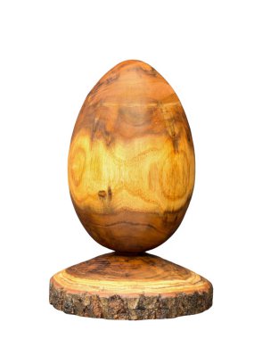 Wooden egg made of acacia tree with bark isolated on white background clipart