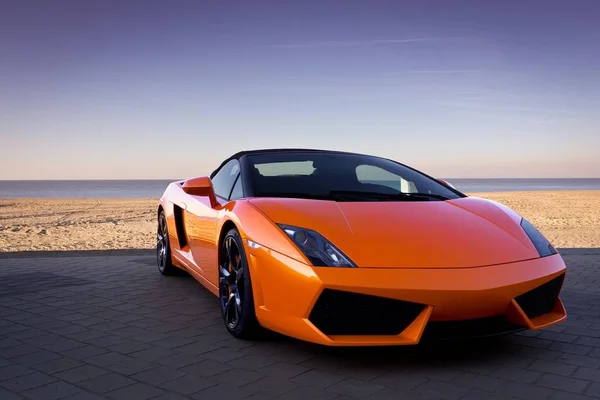 Sleek Looking Fast Sports Car Background Sand — Stock Photo, Image