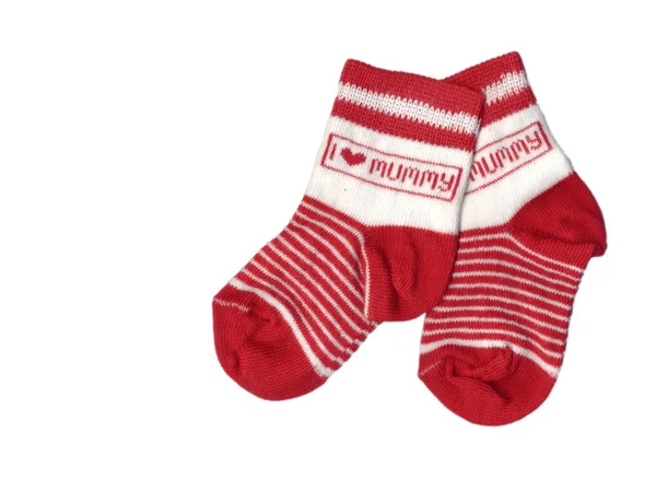 白の上に隔離された赤い幼児の靴下のペア — ストック写真